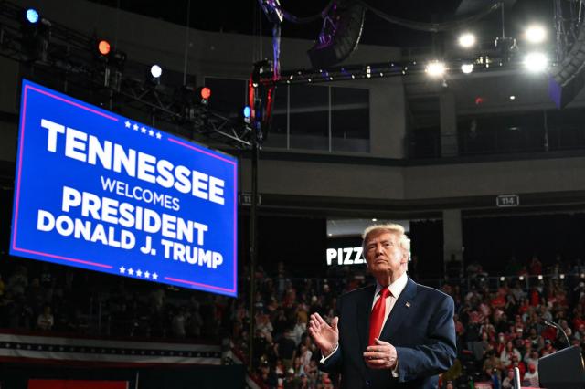 US President Donald Trump exits the stage after speaking during a campaign rally at F&M Bank Arena in Clarksville, Tennessee on October 10, 2026. Trump is campaigning for Republican candidates ahead of the November 3 midterm election. (Photo by Mandel NGAN / AFP)