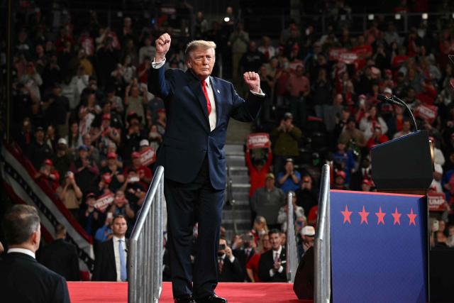 US President Donald Trump dances after concluding his remarks during a campaign rally at F&M Bank Arena in Clarksville, Tennessee on October 10, 2026. Trump is campaigning for Republican candidates ahead of the November 3 midterm election. (Photo by Mandel NGAN / AFP)