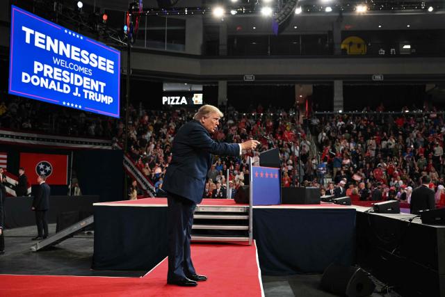 US President Donald Trump gestures as he concludes his remarks during a campaign rally at F&M Bank Arena in Clarksville, Tennessee on October 10, 2026. Trump is campaigning for Republican candidates ahead of the November 3 midterm election. (Photo by Mandel NGAN / AFP)