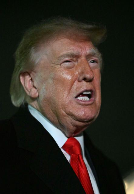 US President Donald Trump speaks with reporters upon his arrival to Joint Base Andrews, Maryland on October 10, 2026. President Trump is returning from Tennessee where he spoke at a campaign rally. (Photo by Mandel NGAN / AFP)