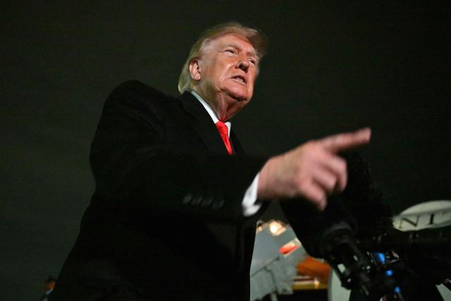 US President Donald Trump speaks with reporters upon his arrival to Joint Base Andrews, Maryland on October 10, 2026. President Trump is returning from Tennessee where he spoke at a campaign rally. (Photo by Mandel NGAN / AFP)