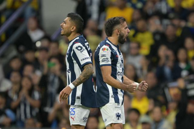 Monterrey's Uruguayan forward #09 Diego Rossi (R) celebrates scoring his team's first goal during the Liga MX Apertura tournament football match between Atlas and Guadalajara at Jalisco stadium in Guadalajara, Mexico, on October 10, 2026. (Photo by CARL DE SOUZA / AFP)