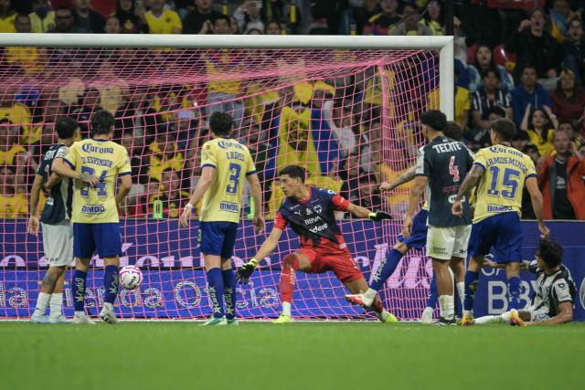 America's defender #14 Santiago Bueno (unseen) scores his team's first goal during the Liga MX Apertura tournament football match between Atlas and Guadalajara at Jalisco stadium in Guadalajara, Mexico, on October 10, 2026. (Photo by CARL DE SOUZA / AFP)
