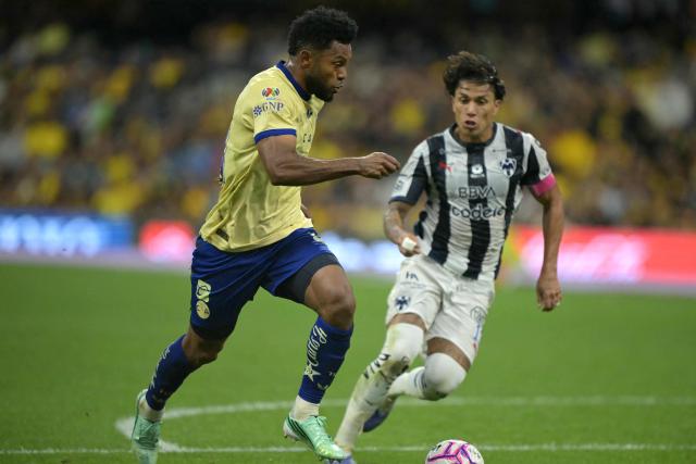 America's Colombian defender #26 Cristian Borja and Monterrey's defender #13 Carlos Salcedo fight for the ball during the Liga MX Apertura tournament football match between America and Monterrey at Banorte stedium in Mexico City, on October 10, 2026. (Photo by CARL DE SOUZA / AFP)