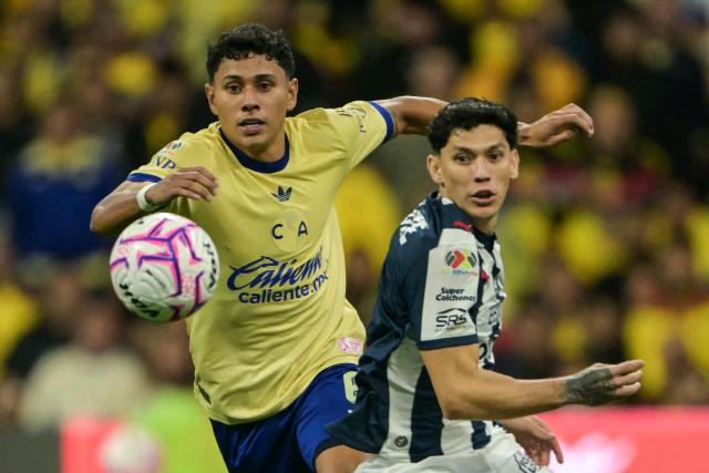 America's midfielder #06 Jonathan dos Santos and Monterrey's defender #03 Gerardo Arteaga eye on the ball during the Liga MX Apertura tournament football match between America and Monterrey at Banorte stedium in Mexico City, on October 10, 2026. (Photo by CARL DE SOUZA / AFP)