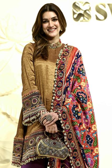 Bollywood actress Kriti Sanon attends a Reliance Foundation event celebrating one year of their flagship retail gallery and museum Swadesh at the UNESCO-designated Art Deco theatre Eros Cinema in Mumbai on October 10, 2026. (Photo by Sujit JAISWAL / AFP)
