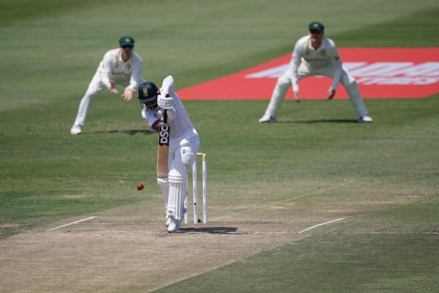 South Africa's Temba Bavuma plays a shot on day three of the first Test match between South Africa and Australia at the Kingsmead stadium in Durban on October 11, 2026. (Photo by Marco Longari / AFP)