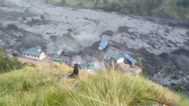 This video grab made from an AFPTV video taken on October 11, 2026 shows flood water destroying buildings along the Budhi Gandaki river, following a flash flood caused by a dry landslide, at Sallari Chumnubri in Nepal's Gorkha district on October 11, 2026. Flash floods surge along Nepals Budhi Gandaki river, destroying buildings and sending muddy waters through the surrounding area.
More than 1,400 people died and over 5,000 remain missing after the catastrophic flood hit Nepal on August 26, which was triggered by a mountain and glacier collapse on the China-Nepal border. (Photo by Sovit Shrestha / AFPTV / AFP)
