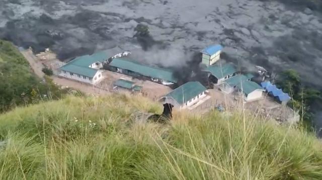 This video grab made from an AFPTV video taken on October 11, 2026 shows flood water destroying buildings along the Budhi Gandaki river, following a flash flood caused by a dry landslide, at Sallari Chumnubri in Nepal's Gorkha district on October 11, 2026. Flash floods surge along Nepals Budhi Gandaki river, destroying buildings and sending muddy waters through the surrounding area.
More than 1,400 people died and over 5,000 remain missing after the catastrophic flood hit Nepal on August 26, which was triggered by a mountain and glacier collapse on the China-Nepal border. (Photo by Sovit Shrestha / AFPTV / AFP)