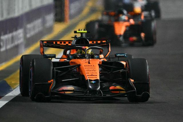 McLaren's British driver Lando Norris steers his car during the Formula One Singapore Grand Prix at the Marina Bay Street Circuit in Singapore on October 11, 2026. (Photo by ANTHONY WALLACE / AFP)