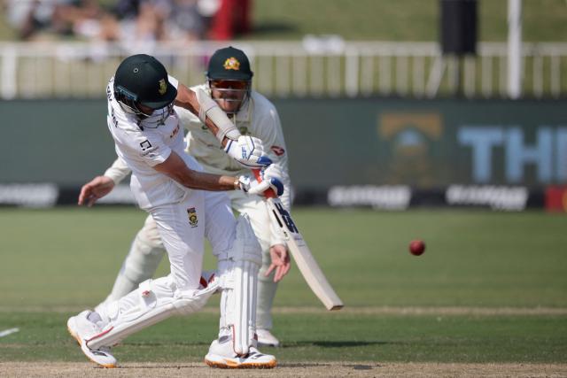 South Africa's Keshav Maharaj plays a shot on day three of the first Test match between South Africa and Australia at the Kingsmead stadium in Durban on October 11, 2026. (Photo by Marco Longari / AFP)