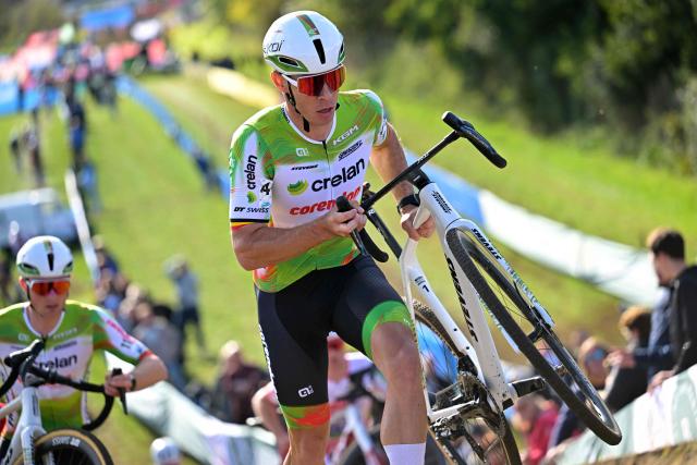 Belgium's rider Laurens Sweeck competes during the men’s elite race at the ‘Mosselcross’ cyclocross event, the first of seven events in the HG Cross competition, in Dendermonde on October 11, 2026. (Photo by DAVID PINTENS / Belga / AFP) / Belgium OUT