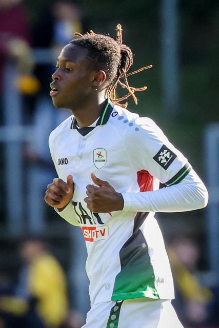 OH Leuven's Belgian defender #99 Davis Opoku celebrates after scoring OH Leuven's first goal during the Belgian "Pro League" First Division football match between Royale Union Saint-Gilloise and Oud-Heverlee Leuven at Parc Duden in Brussels on October 11, 2026. (Photo by VIRGINIE LEFOUR / BELGA / AFP) / Belgium OUT