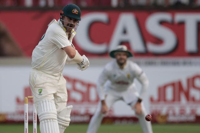 Australia's Travis Head plays a shot on day three of the first Test match between South Africa and Australia at the Kingsmead stadium in Durban on October 11, 2026. (Photo by Marco Longari / AFP)