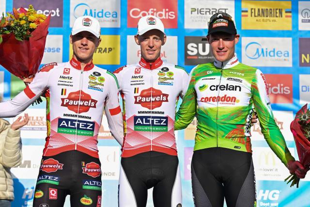 (From L) Second-placed  Belgium's Yordi Corsus, winner Belgium's Michael Vanthourenhout and third-placed Belgium's Gerben Kuypers celebrate on the podium of  the men’s elite race at the ‘Mosselcross’ cyclocross event, the first of seven events in the HG Cross competition, in Dendermonde on October 11, 2026. (Photo by DAVID PINTENS / Belga / AFP) / Belgium OUT