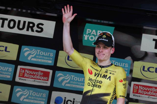Team Visma Lease a Bike's Norwegian rider Per Strand Gagenes waves from the podium after winning the 120th edition of Paris-Tours, a 216-km cycling race from Chartres to Tours, in Tours, France, on October 11, 2026. (Photo by Alain JOCARD / AFP)