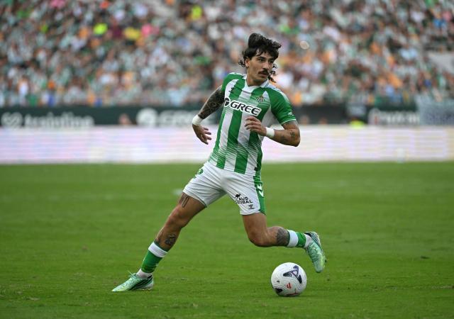 Real Betis' Spanish defender #02 Hector Bellerin controls the ball during the Spanish league football match between Real Betis and CA Osasuna at Benito Villamarin Stadium in Seville on October 11, 2026. (Photo by JORGE GUERRERO / AFP)