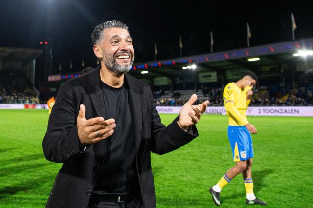 Westerlo's head coach Issame Charai celebrate after winning the Belgian "Pro League" First Division football match between KVC Westerlo and Royal Antwerp at Het Kuipje in Westerlo on October 11, 2026. (Photo by EMILE WINDAL / BELGA / AFP) / Belgium OUT