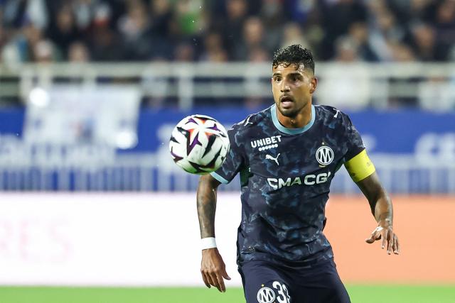 Marseille's Italian defender #33 Emerson eyes the ball during the French L1 football match between ES Troyes AC and Olympique de Marseille (OM) at the Stade de l'Aube in Troyes, central France, on October 11, 2026. (Photo by Sameer Al-DOUMY / AFP)