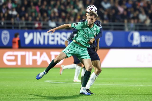 Troyes' French forward #09 Jeremy Le Douaron heads the ball  during the French L1 football match between ES Troyes AC and Olympique de Marseille (OM) at the Stade de l'Aube in Troyes, central France, on October 11, 2026. (Photo by Sameer Al-DOUMY / AFP)