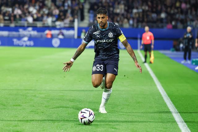 Marseille's Italian defender #33 Emerson runs with the ball during the French L1 football match between ES Troyes AC and Olympique de Marseille (OM) at the Stade de l'Aube in Troyes, central France, on October 11, 2026. (Photo by Sameer Al-DOUMY / AFP)