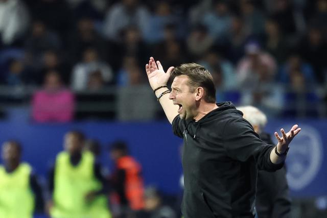 Troyes' French headcoach Stéphane Dumont gestures during the French L1 football match between ES Troyes AC and Olympique de Marseille (OM) at the Stade de l'Aube in Troyes, central France, on October 11, 2026. (Photo by Sameer Al-DOUMY / AFP)