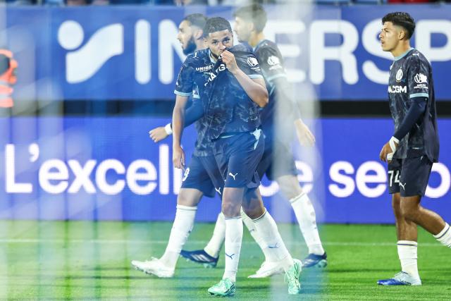 Marseille's Moroccan forward #77 Amine Harit celebrates after scoring a goal during the French L1 football match between ES Troyes AC and Olympique de Marseille (OM) at the Stade de l'Aube in Troyes, central France, on October 11, 2026. (Photo by Sameer Al-DOUMY / AFP)