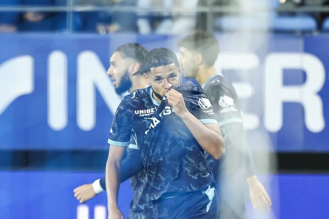 Marseille's Moroccan forward #77 Amine Harit celebrates after scoring a goal during the French L1 football match between ES Troyes AC and Olympique de Marseille (OM) at the Stade de l'Aube in Troyes, central France, on October 11, 2026. (Photo by Sameer Al-DOUMY / AFP)
