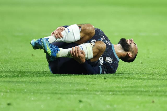 Marseille's Algerian midfielder #08 Himad Abdelli reacts in pain during the French L1 football match between ES Troyes AC and Olympique de Marseille (OM) at the Stade de l'Aube in Troyes, central France, on October 11, 2026. (Photo by Sameer Al-DOUMY / AFP)
