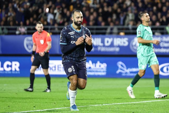 Marseille's Algerian midfielder #08 Himad Abdelli celebrates scoring his team's second goal during the French L1 football match between ES Troyes AC and Olympique de Marseille (OM) at the Stade de l'Aube in Troyes, central France, on October 11, 2026. (Photo by Sameer Al-DOUMY / AFP)