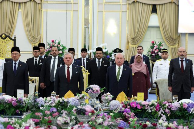 Jordan's King Abdullah II (front 2nd L) attends a banquet with Malaysia's King Sultan Ibrahim Sultan Iskandar and Prime Minister Anwar Ibrahim (L) at the National Palace in Kuala Lumpur on October 12, 2026. (Photo by Hasnoor Hussain / POOL / AFP)