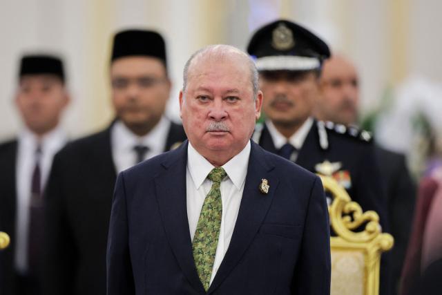 Malaysia's King Sultan Ibrahim Sultan Iskandar attends a banquet with Jordan's King Abdullah II's at the National Palace in Kuala Lumpur on October 12, 2026. (Photo by Hasnoor Hussain / POOL / AFP)