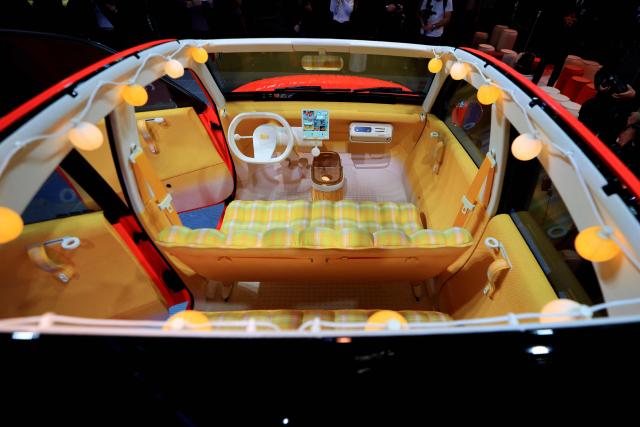 This photograph shows the Citroen 2 CV Concept car car during the 91st edition of the international Paris Motor Show at the Porte de Versailles in Paris on October 12, 2026. (Photo by Ludovic MARIN / AFP)