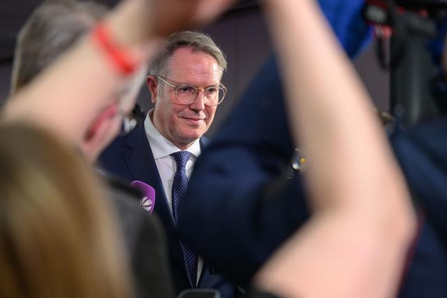 (FILES) Then outgoing state premier of Rhineland-Palatinate, Alexander Schweitzer, speaks to the media during the Social Democratic Party (SPD) election event after the first exit polls of Rhineland-Palatinates state elections on March 22, 2026, in Mainz, southwestern Germany. Following the resignation of Baerbel Bas (SPD) as Germany's labour minister, former Rhineland-Palatinate state premier Alexander Schweitzer (SPD) is to become her successor in the cabinet. This was confirmed to AFP by party sources on October 12, 2026. Bas had previously announced her resignation from the co-leadership of the party and from her ministerial post. (Photo by DANIEL PETER / AFP)