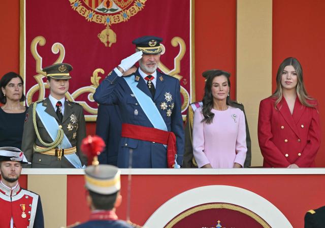 Spain's King Felipe VI, Queen Letizia, Princess Leonor (L) and Princess Sofia (R) attend Spain's National Day military parade in Madrid, on October 12, 2026. (Photo by JAVIER SORIANO / AFP)