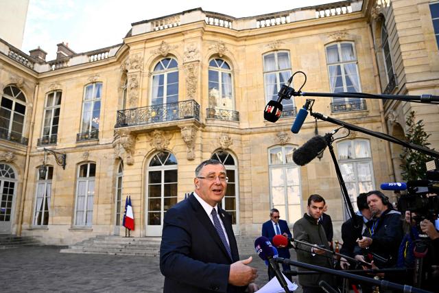 CEO of TotalEnergies Patrick Pouyanne talks to journalists after a meeting with fuel distributors and France's Prime Minister to speed up the release of diesel stocks at Hotel Matignon in Paris on October 12, 2026. (Photo by JULIEN DE ROSA / AFP)