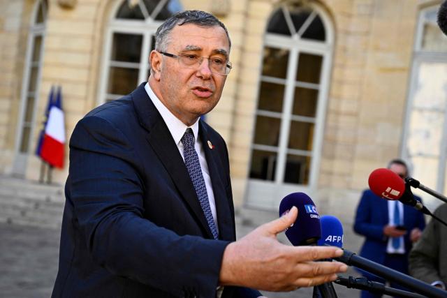 CEO of TotalEnergies Patrick Pouyanne talks to journalists after a meeting with fuel distributors and France's Prime Minister to speed up the release of diesel stocks at Hotel Matignon in Paris on October 12, 2026. (Photo by JULIEN DE ROSA / AFP)