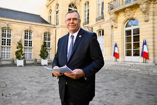 CEO of TotalEnergies Patrick Pouyanne leaves after a meeting with fuel distributors and France's Prime Minister to speed up the release of diesel stocks at Hotel Matignon in Paris on October 12, 2026. (Photo by JULIEN DE ROSA / AFP)