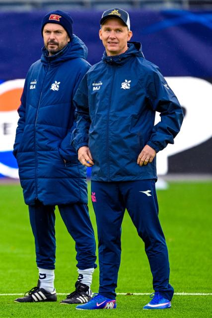 Viking's head coaches Morten Jensen (R) and Bjarte Lunde Aarsheim look on during a training session in Stavanger, Norway on October 12, 2026, on the eve of the UEFA Champions League football match against FC Bayern Munich. (Photo by Carina Johansen / NTB / AFP) / Norway OUT