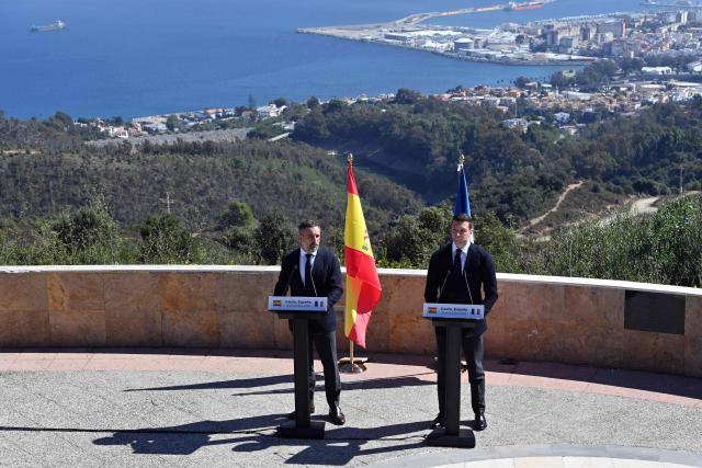 Leader of Spanish far-right party Vox Santiago Abascal (L) and President of French far-right party Rassemblement National (RN) Jordan Bardella give a joint press conference in Spain's North African enclave of Ceuta on October 12, 2026 amid migration crisis. The Spanish North African enclave of some 80,000 inhabitants seek to regain balance while hundreds of migrants remain in makeshifts camp after the massive influx of tens of thousands of migrants from Morocco in late July. (Photo by Antonio Sempere / AFP)