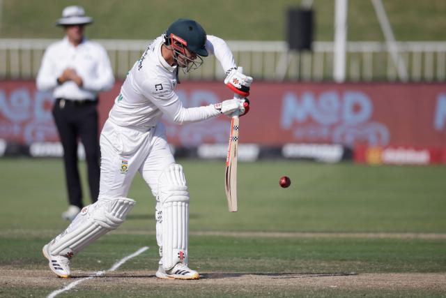 South Africa's David Bedingham plays a shot on day four of the first Test match between South Africa and Australia at the Kingsmead stadium in Durban on October 12, 2026. (Photo by Marco Longari / AFP)