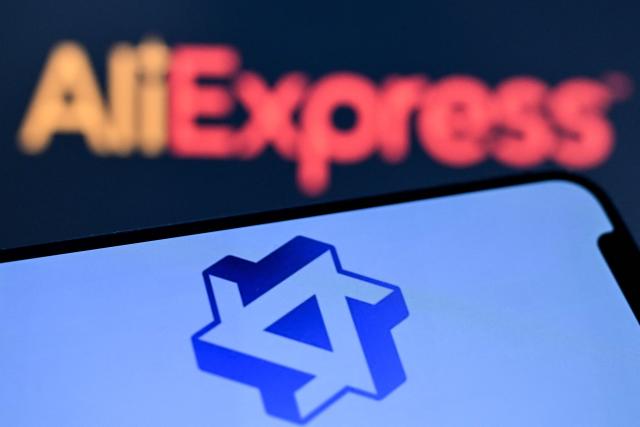 A photo taken on October 12, 2026 shows AliExpress logo on a laptop screen next to the logo of China's Tongyi Qianwen AI application (bottom) by Alibaba group on a smartphone screen in Frankfurt am Main, western Germany. (Photo by Kirill KUDRYAVTSEV / AFP)