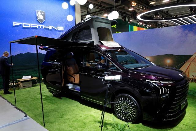 This photograph shows the Forthing V9 van at the 91st edition of the international Paris Motor Show at the Porte de Versailles in Paris on October 12, 2026. (Photo by Ludovic MARIN / AFP)