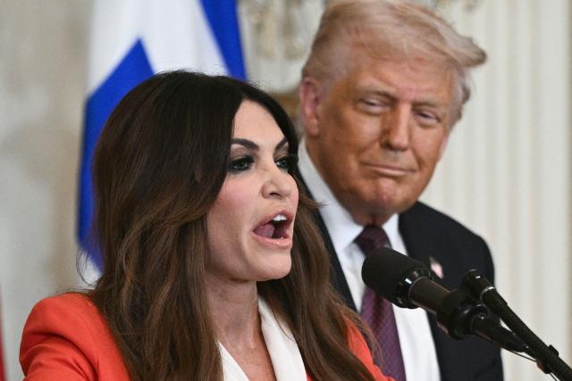 (FILES) Kimberly Guilfoyle, President Trump's nominee to be the US ambassador to Greece, speaks alongside US President Donald Trump, during a Greek Independence Day celebration in the East Room of the White House in Washington, DC, on March 24, 2025. US President Donald Trump and Secretary of State Marco Rubio are considering firing the US ambassador to Greece, Kimberly Guilfoyle, who has come under pressure following a series of damaging revelations, American media has reported. Trump is expected to decide soon on the fate of his eldest son Donald Trump Jr.'s former fiancee, CNN reported on October 11, 2026. In recent days, the Wall Street Journal has published a series of highly embarrassing articles about the former Fox News host, who became a prominent figure in Trump's Make America Great Again movement. (Photo by Brendan SMIALOWSKI / AFP)