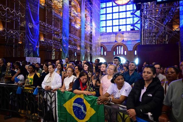 Catholic devotees attend celebrations marking Our Lady of Aparecida Day at the Basilica of the National Shrine of Our Lady of Aparecida, Brazil's patron saint, in Aparecida, Sao Paulo state, Brazil, on October 12, 2026. (Photo by Pablo PORCIUNCULA / AFP)