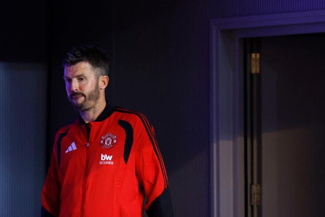 Manchester United's English head coach Michael Carrick attends a press conference on the eve of the UEFA Champions League, league phase matchday 2 football match between Club Atletico de Madrid and Manchester United at the Metropolitano stadium in Madrid on October 12, 2026. (Photo by Oscar DEL POZO / AFP)