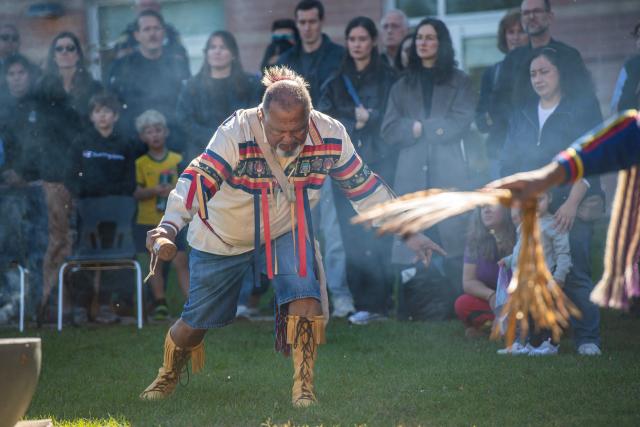 People take part in the Calumet dance during an Indigenous People's Day event in Newton, Massachusetts, October 12, 2026. (Photo by JOSEPH PREZIOSO / AFP)