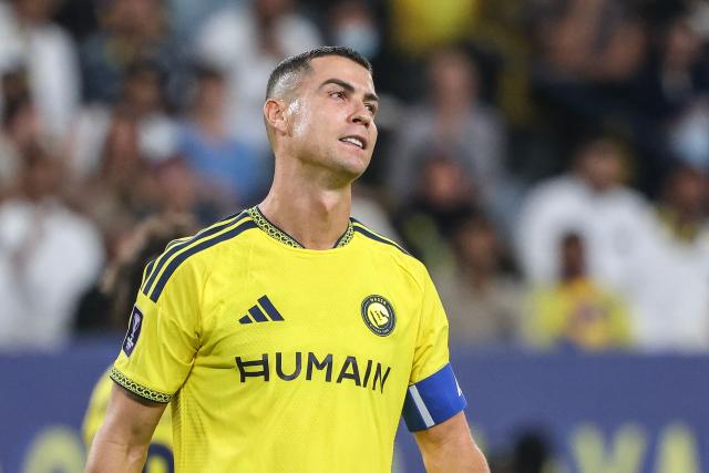 Nassr's Portuguese forward #07 Cristiano Ronaldo reacts after missing a shot during the AFC Champions League group B football match between Al-Nassr and Neftchi Fergana at the Alawwal Park stadium in Riyadh on October 12, 2026. (Photo by Fayez NURELDINE / AFP)