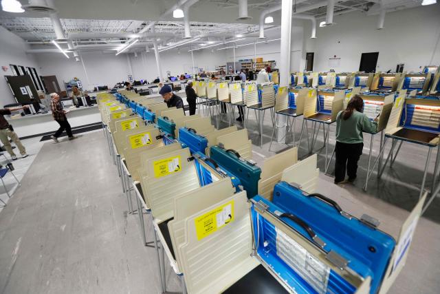 Voters cast their ballots for the United States midterm election at the Summit County Board of elections in Akron Ohio on 12 October, 2026. Americans voting in the November 3 midterm elections will decide who controls Congress for the final two years of Donald Trump's presidency, along with dozens of governorships and thousands of state offices. (Photo by David MAXWELL / AFP)