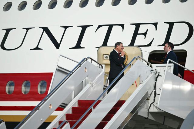 US Senator John Barrasso, Republican from Wyoming is seen waiting ahead of US President Donald Trump boarding Air Force One at Joint Base Andrews, Maryland on October 12, 2026. President Trump is traveling to Youngstown, Ohio, to hold a campaign rally ahead of the midterm elections. (Photo by Kent NISHIMURA / AFP)